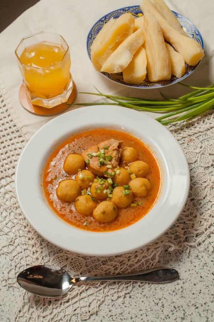 Delicious traditional Paraguayan soup with cassava served on a lace cloth.